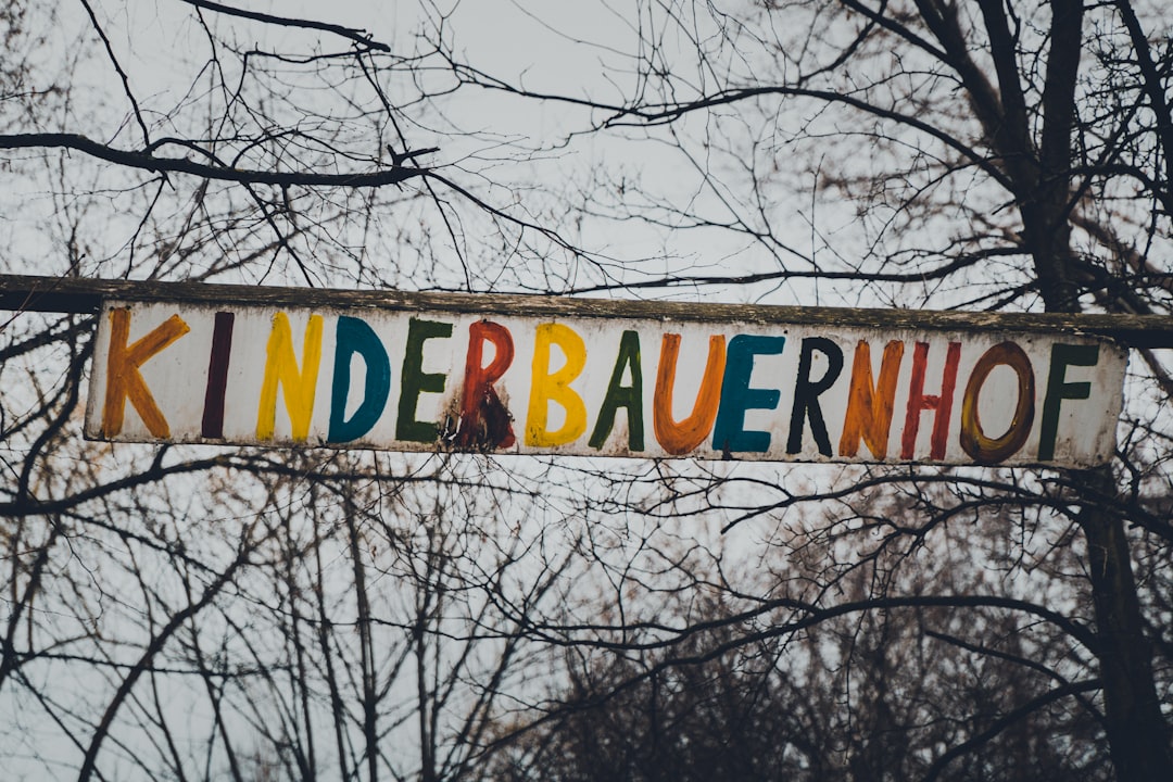 brown and white wooden signage